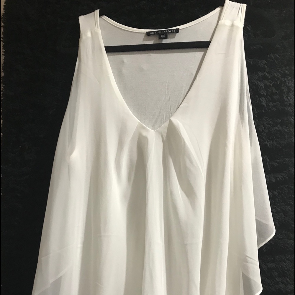 Sleeveless white blouse
